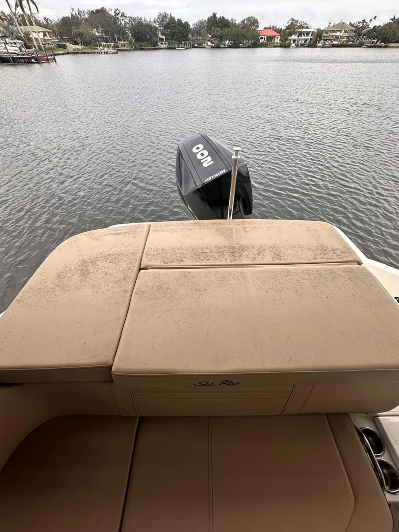 Slide: The Image of 2019 Sea Ray SPX 230 OB boat with outboard motor on calm water. - 10