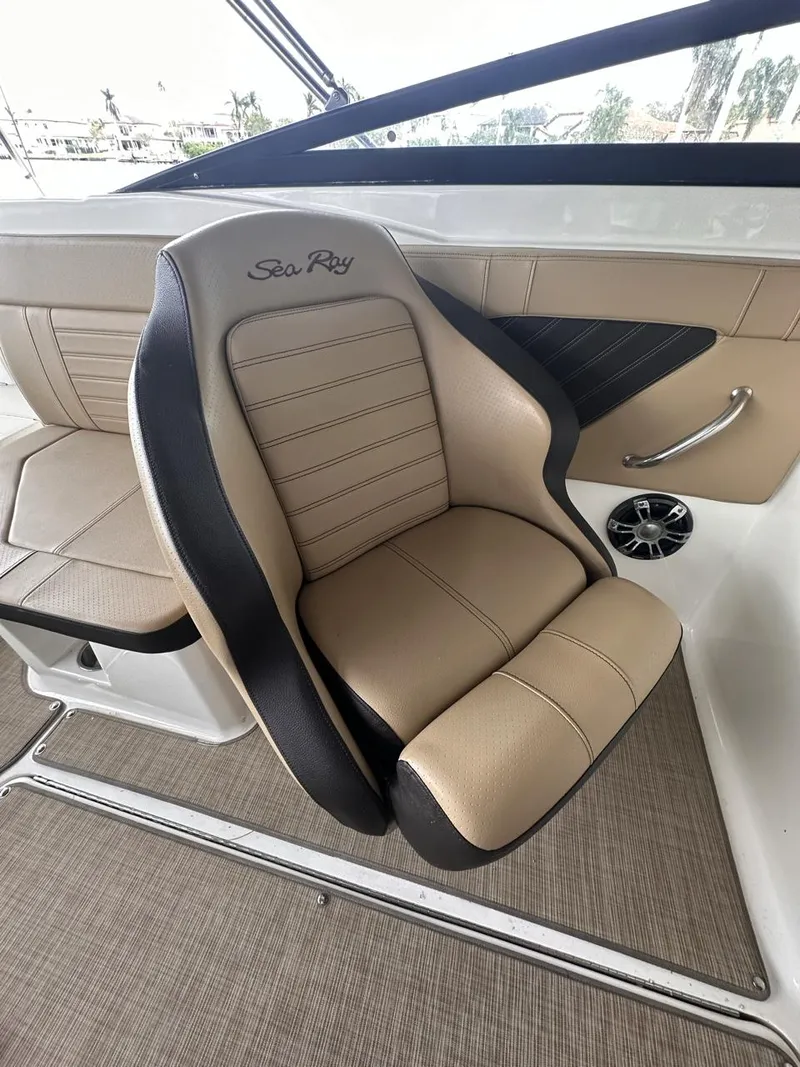 Slide: The Image of 2019 Sea Ray SPX 230 OB boat seat, beige and black, luxurious design. - 11