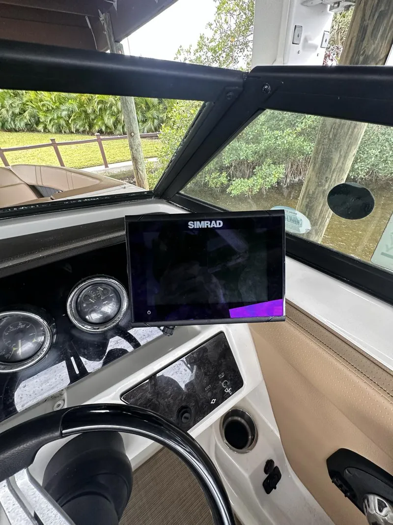 Slide: The Image of Simrad display on 2019 Sea Ray SPX 230 OB boat dashboard. - 29