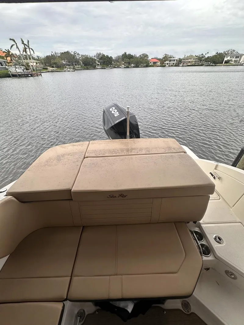 Slide: The Image of 2019 Sea Ray SPX 230 OB boat with outboard motor on a calm lake. - 9