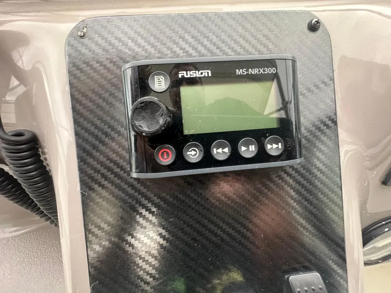 Slide: The Image of Fusion MS-NRX300 marine stereo on 2001 Wellcraft 3300 Martinique dashboard. - 11