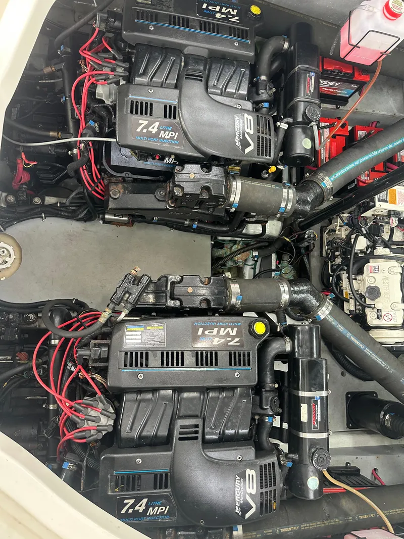 Slide: The Image of Twin 7.4 MPI engines in a 2001 Wellcraft 3300 Martinique boat. - 8
