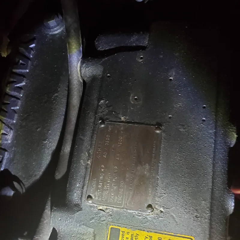 Slide: The Image of Close-up of a 1987 Irwin MKII engine component with identification plate. - 33