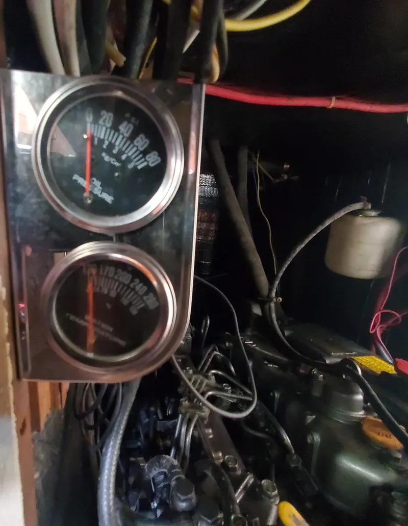 Slide: The Image of Engine compartment of a 1987 Irwin MKII with gauges and wiring. - 37