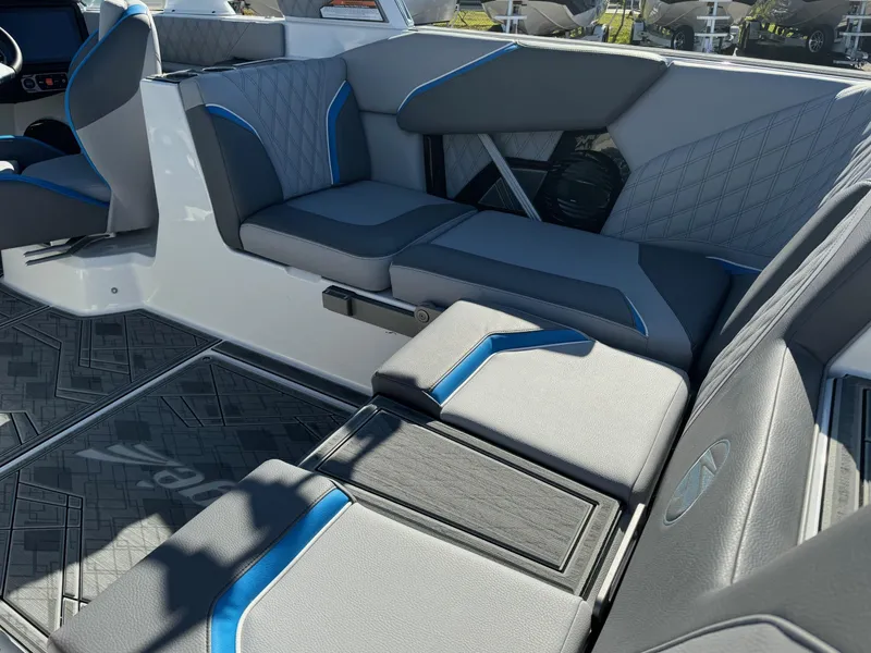 Slide: The Image of 2025 Tigé 24RZX boat interior with modern seating and stylish design. - 11