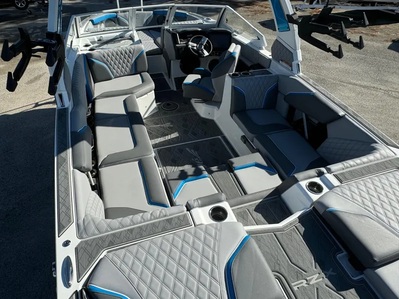 Slide: The Image of 2025 Tigé 24RZX boat interior with luxurious seating and modern design. - 7