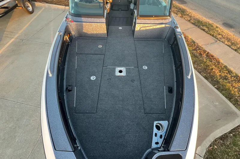 Slide: The Image of 2025 Lund 219 Pro-V GL boat deck, spacious and well-equipped for fishing. - 14