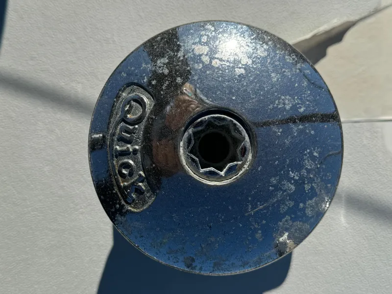 Slide: The Image of Close-up of a weathered metal fitting on a 1992 Hunter 35 sailboat. - 18