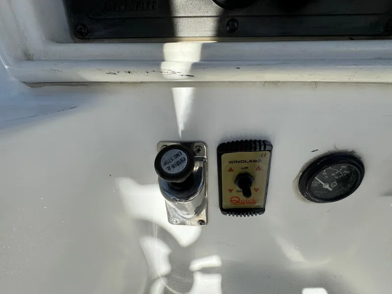 Slide: The Image of Control panel of a 1992 Hunter 35 boat with windlass switch and gauge. - 26