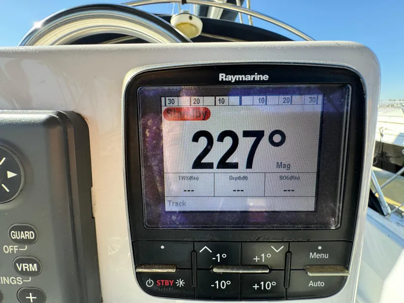 Slide: The Image of Raymarine navigation display showing 227 degrees on a 1992 Hunter 35 sailboat. - 30