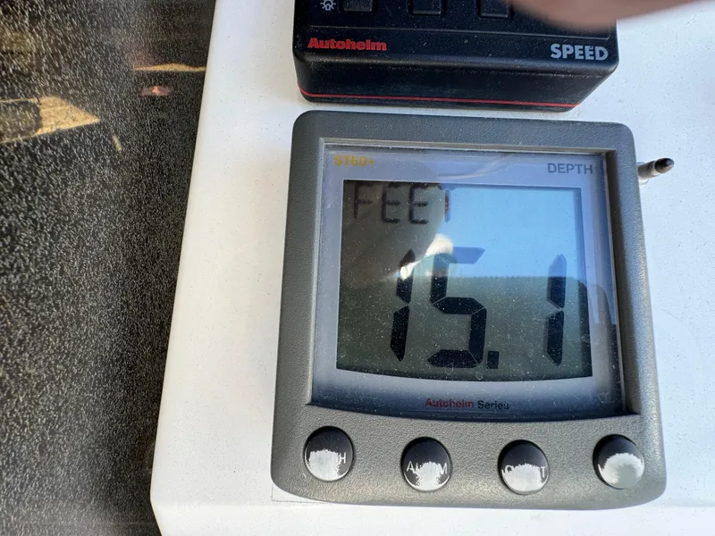 Slide: The Image of Depth gauge displaying 15.1 feet on a 1992 Hunter 35 sailboat. - 34