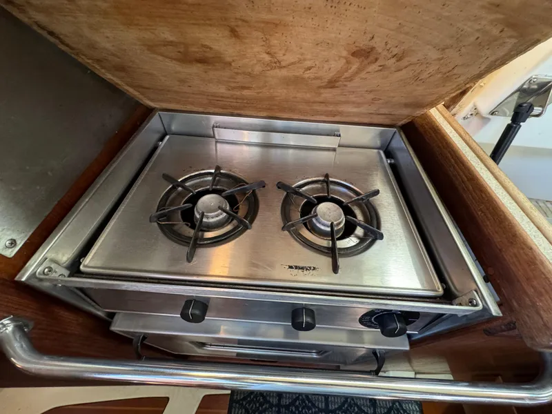 Slide: The Image of Stainless steel two-burner stove in a 1992 Hunter 35 sailboat galley. - 43