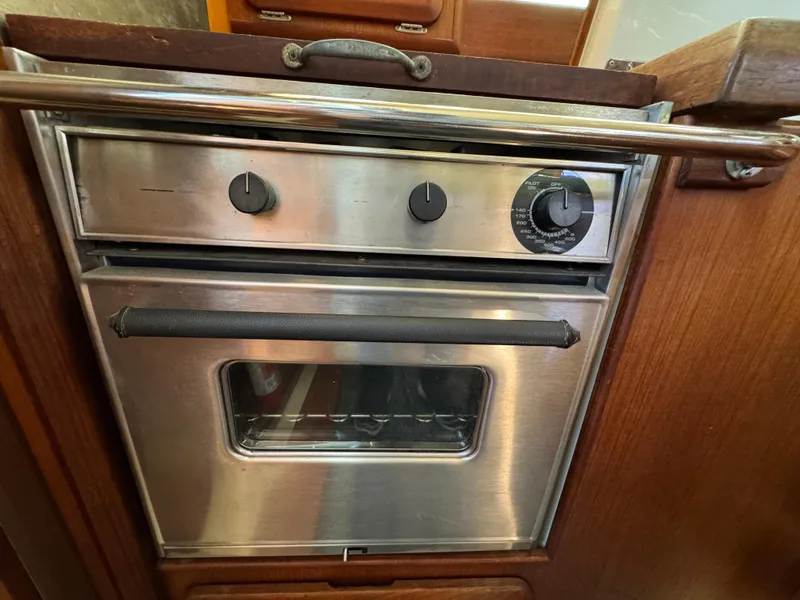 Slide: The Image of Stainless steel oven in a 1992 Hunter 35 boat kitchen. - 44