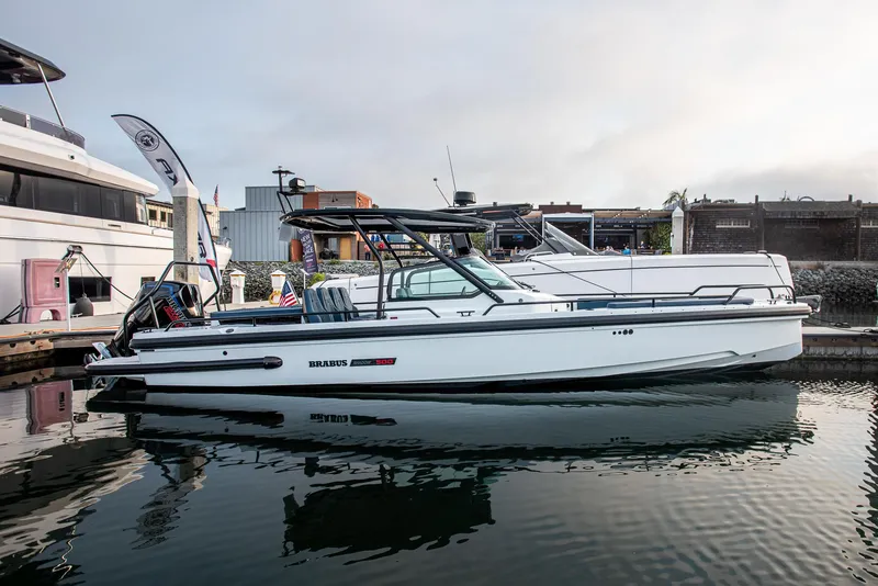 The Image of 2023 BRABUS Shadow 500 T-Top AFT Cabin boat docked in marina. - 1
