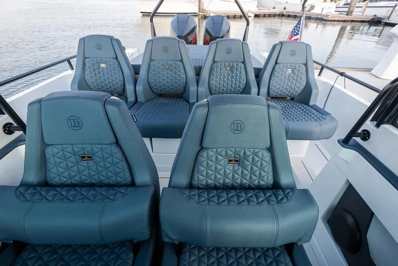 Slide: The Image of Luxurious seating on 2023 BRABUS Shadow 500 T-Top AFT Cabin boat. - 12