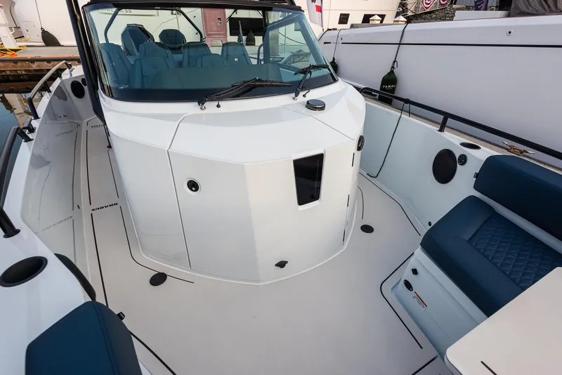 Slide: The Image of 2023 BRABUS Shadow 500 T-Top AFT Cabin boat with sleek design and spacious seating. - 9