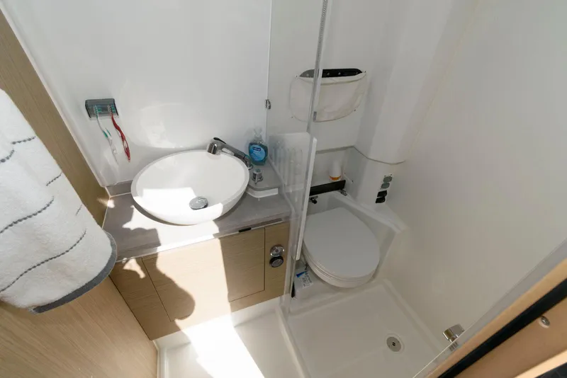 Slide: The Image of Compact bathroom in 2023 Jeanneau Leader 10.5 CC boat with sink, toilet, and shower. - 29