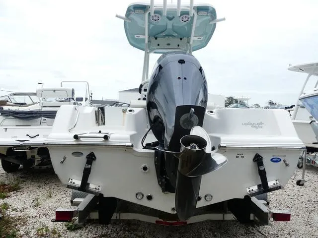 Slide: The Image of 2023 Tidewater 210 CC Adventure boat, rear view with outboard motor. - 6