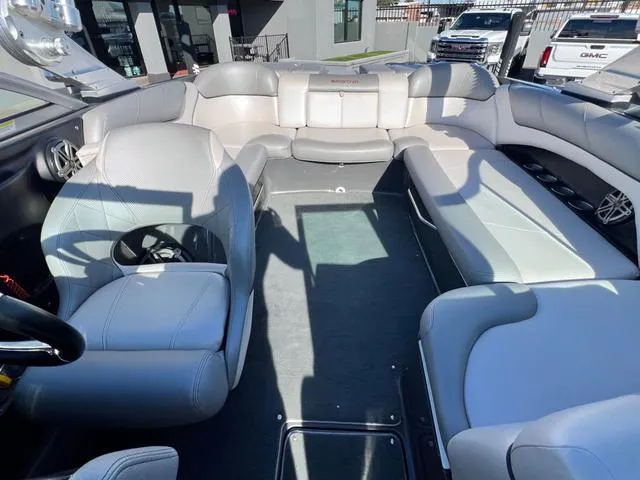 Slide: The Image of 2012 MasterCraft X25 boat interior with spacious seating and modern design. - 17