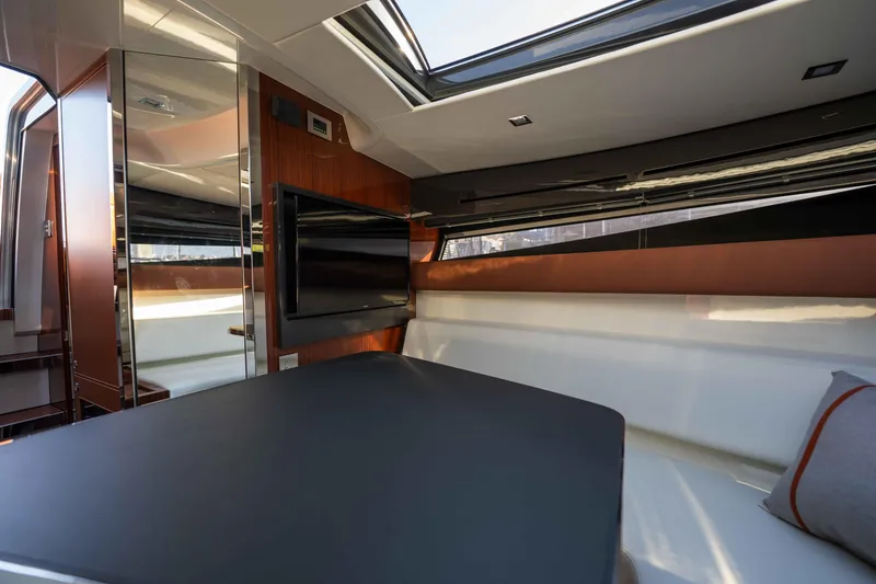 Slide: The Image of Interior of 2024 Riva 38 Rivamare yacht, featuring sleek design and modern amenities. - 16
