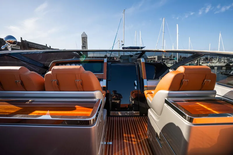 Slide: The Image of 2024 Riva 38 Rivamare yacht interior with luxurious seating and sleek design. - 25