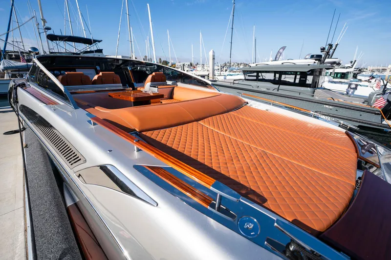 Slide: The Image of 2024 Riva 38 Rivamare luxury yacht with sleek design and elegant leather seating. - 31