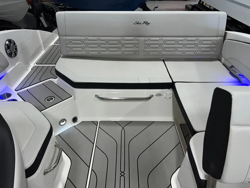 Slide: The Image of 2025 Sea Ray SPX 210 boat interior with sleek seating and modern design. - 41