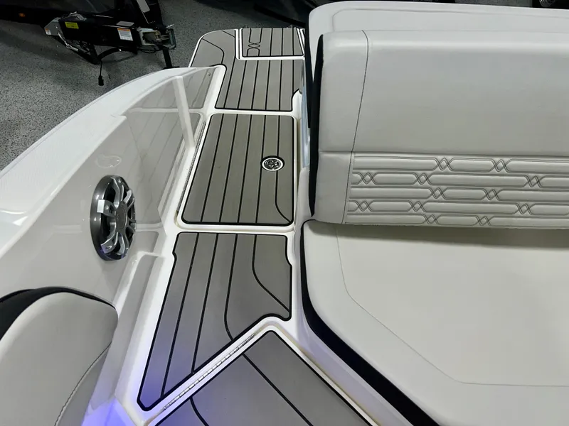 Slide: The Image of 2025 Sea Ray SPX 210 boat interior with sleek seating and modern design. - 47