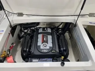 Slide: The Image of 2025 Sea Ray SPX 210 engine compartment with powerful 250 horsepower engine. - 70