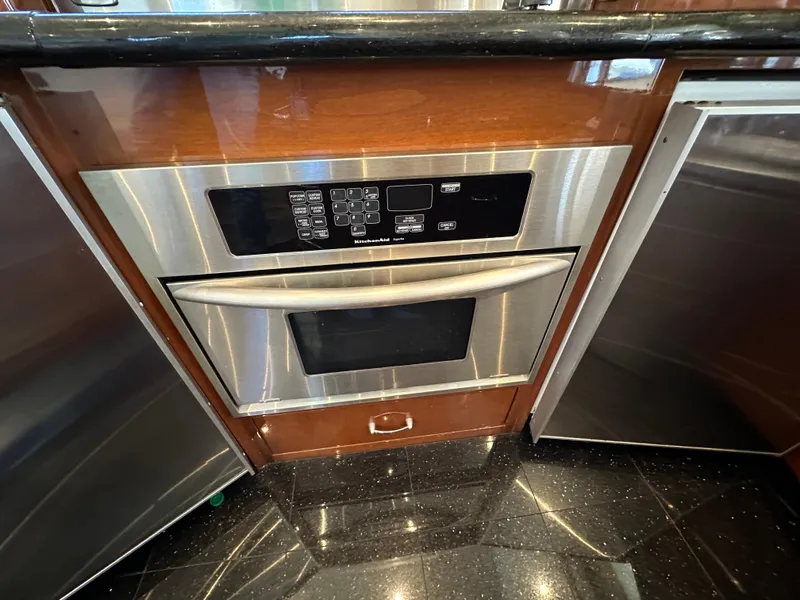 Slide: The Image of Stainless steel oven in 2004 Marquis 59 yacht kitchen. - 14