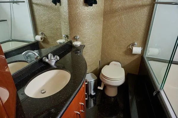 Slide: The Image of Luxurious 2004 Marquis 59 yacht bathroom with elegant fixtures and modern design. - 32