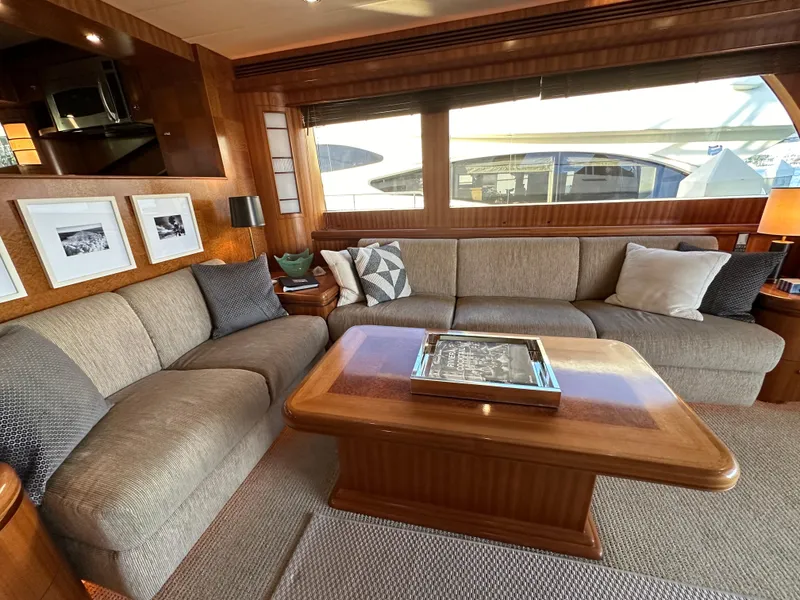 Slide: The Image of Luxurious 2007 Horizon 73 Motor Yacht interior with elegant seating and wooden accents. - 14