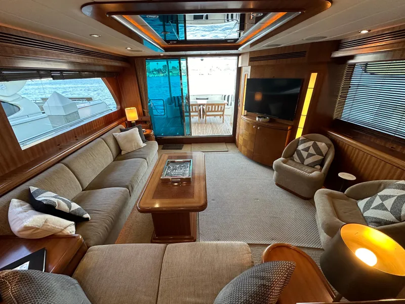 Slide: The Image of Luxurious interior of 2007 Horizon 73 Motor Yacht with elegant seating and large windows. - 15