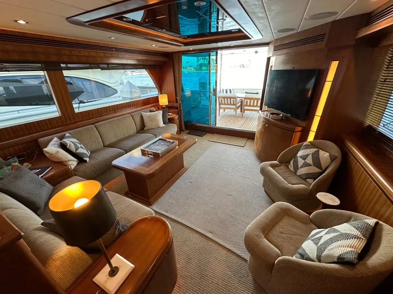 Slide: The Image of Luxurious interior of 2007 Horizon 73 Motor Yacht with elegant seating and large windows. - 16