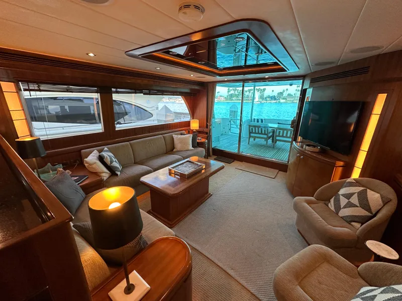 Slide: The Image of Luxurious interior of 2007 Horizon 73 Motor Yacht with elegant seating and large windows. - 19