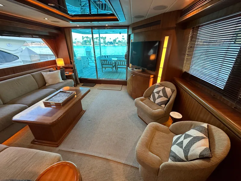 Slide: The Image of Luxurious interior of 2007 Horizon 73 Motor Yacht with plush seating and large windows. - 20