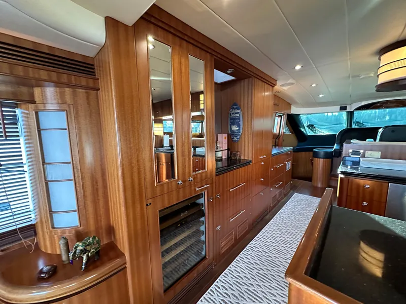 Slide: The Image of Luxurious interior of 2007 Horizon 73 Motor Yacht with elegant wood finishes and modern amenities. - 23