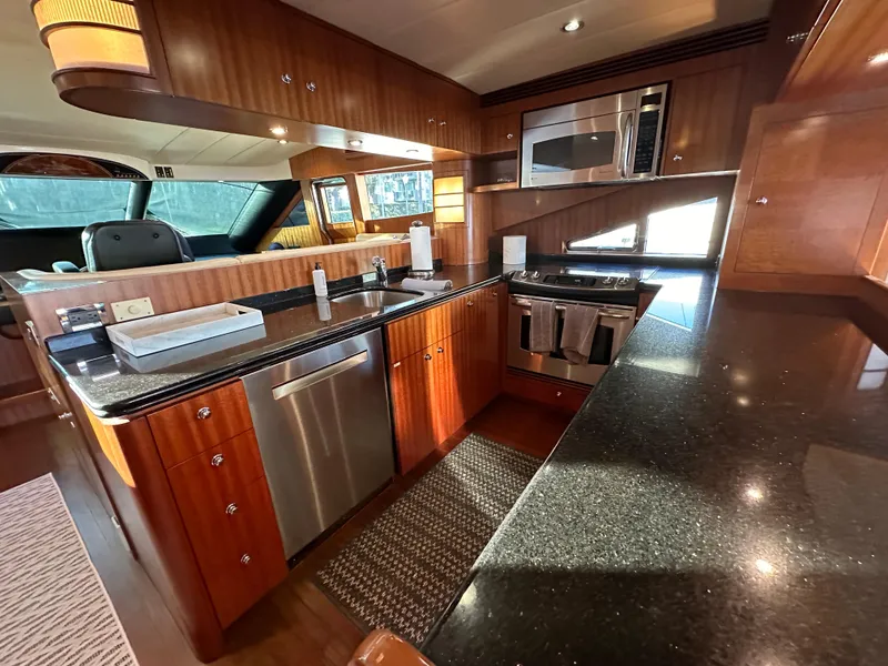 Slide: The Image of Luxurious kitchen interior of 2007 Horizon 73 Motor Yacht with modern appliances. - 26
