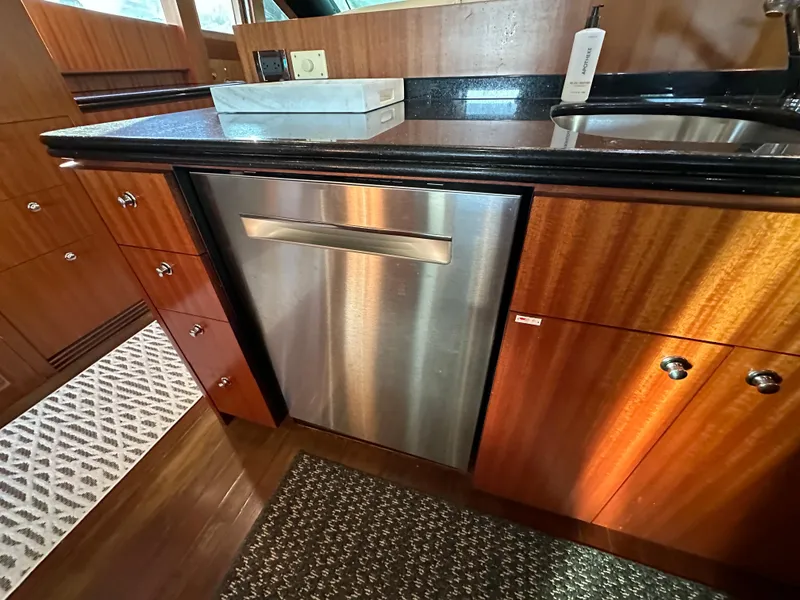 Slide: The Image of Luxurious kitchen interior of 2007 Horizon 73 Motor Yacht with stainless steel appliances. - 30