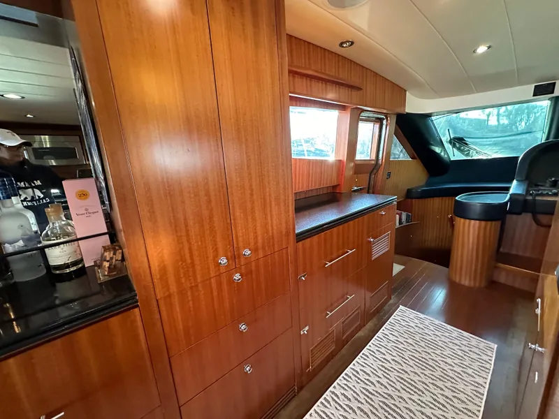 Slide: The Image of Luxurious interior of 2007 Horizon 73 Motor Yacht with wood cabinetry and modern design. - 34