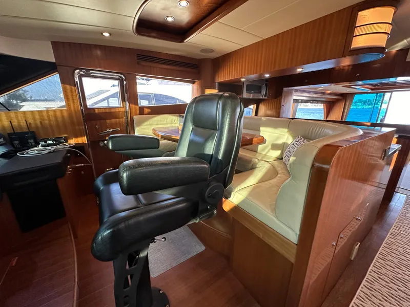Slide: The Image of Luxurious interior of 2007 Horizon 73 Motor Yacht with leather seating and wood finishes. - 37