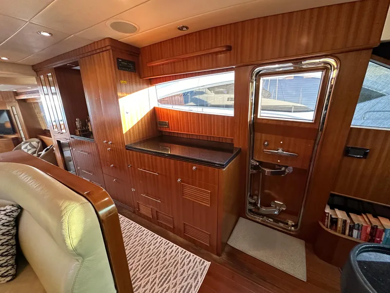 Slide: The Image of Luxurious interior of 2007 Horizon 73 Motor Yacht with wood paneling and modern amenities. - 46