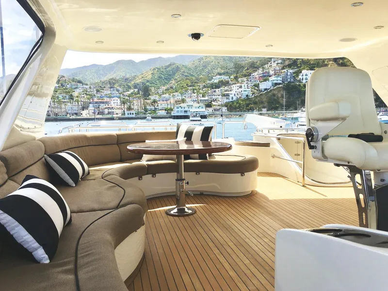 Slide: The Image of Luxurious 2007 Horizon 73 Motor Yacht interior with scenic coastal view. - 49