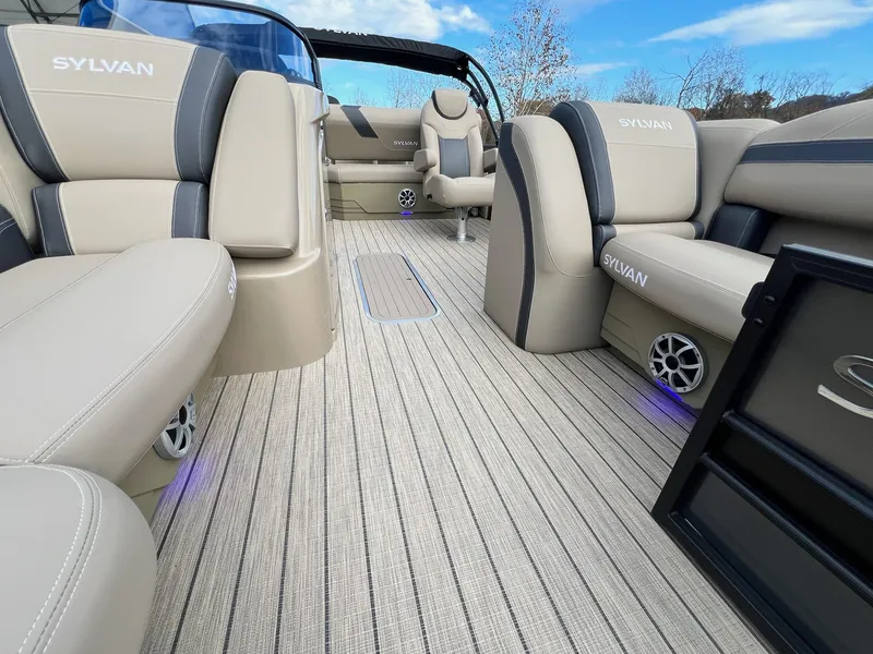 Slide: The Image of Luxurious interior of 2025 Sylvan L3 DLZ Tritoon with plush seating and modern design. - 11