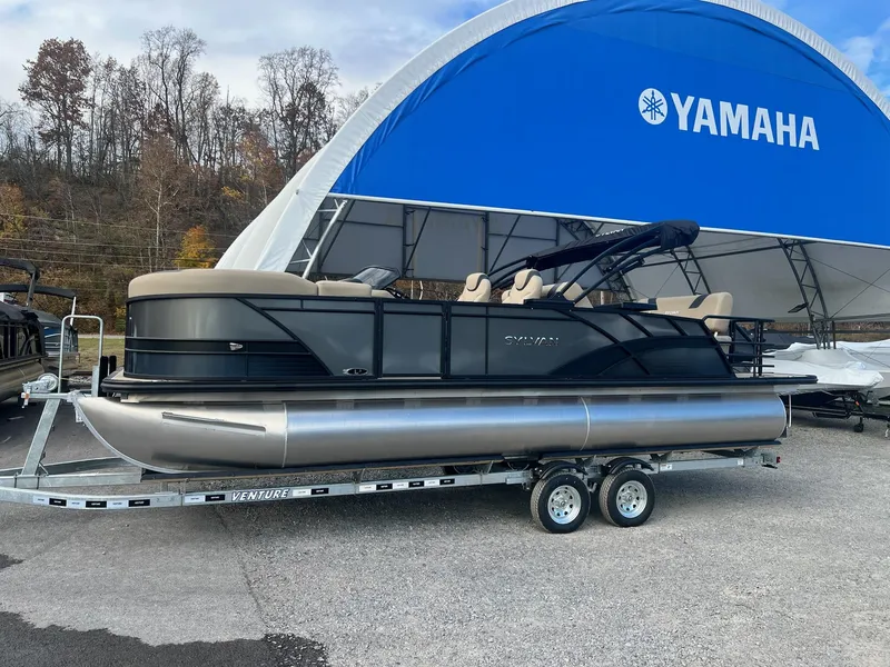 Slide: The Image of 2025 Sylvan L3 DLZ Tritoon boat on trailer under Yamaha canopy. - 33