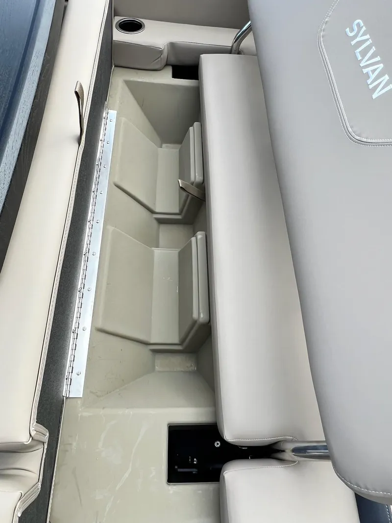 Slide: The Image of 2025 Sylvan L3 DLZ Tritoon interior seating and storage area. - 41