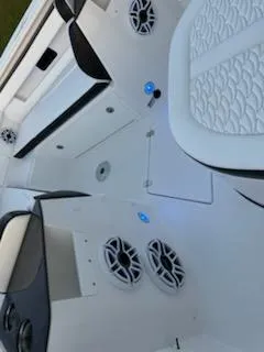Slide: The Image of 2024 Crevalle 33 CSF boat interior with speakers and seating. - 11