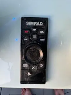 Slide: The Image of Simrad remote control on a Crevalle 33 CSF, 2024 model. - 18