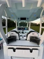 Slide: The Image of 2024 Crevalle 33 CSF boat interior with advanced navigation system and seating. - 25