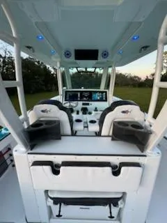 Slide: The Image of 2024 Crevalle 33 CSF boat interior with advanced navigation system and seating. - 26